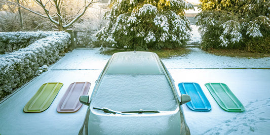 Multi-pack of snow scrapers to buy for clearing a car covered in snow.