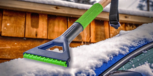 An oversized ice scraper clearing thick ice from a car windshield.
