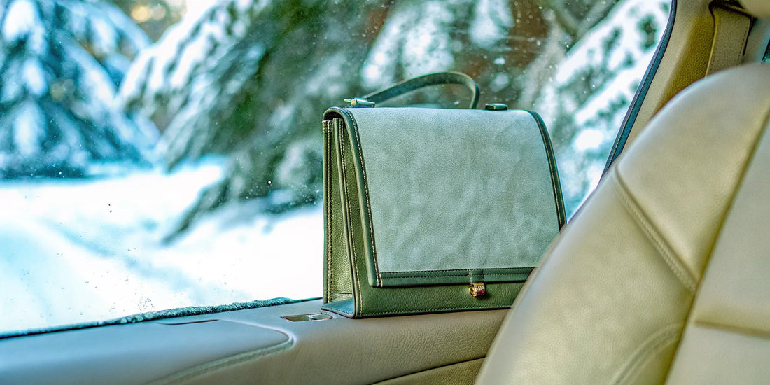 Branded custom snow scraper on a car seat as a premium corporate gift