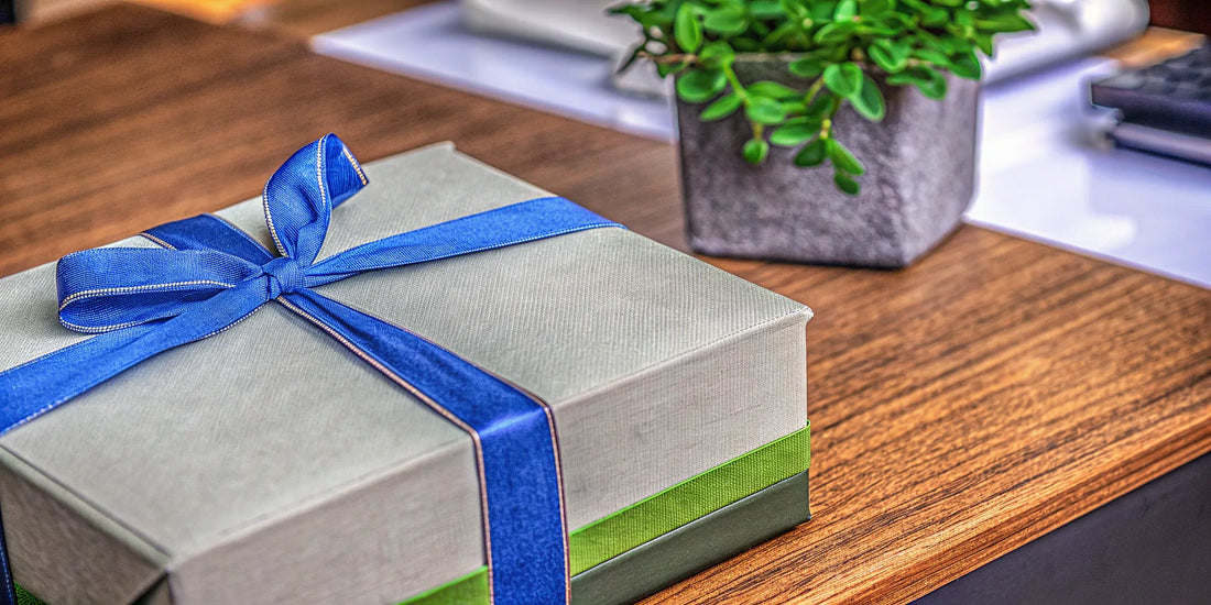 A gift box on a desk, one of the best promotional gifts that build brand awareness.