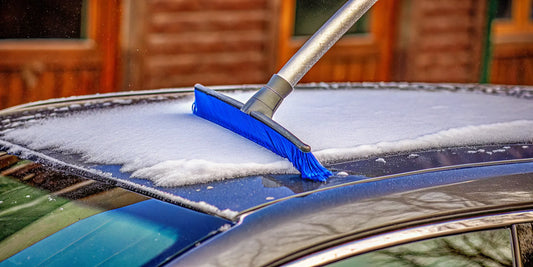 A soft snow brush alternative clearing snow from a car without scratching the paint.