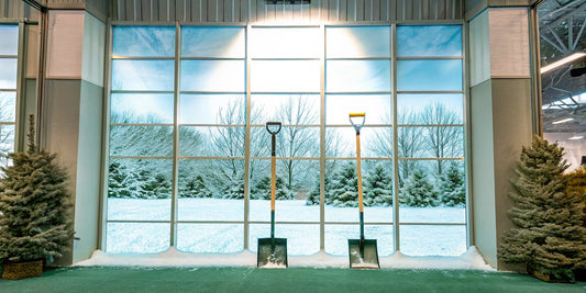 Trade show booth display featuring custom branded ice scrapers as corporate giveaway items for winter markets