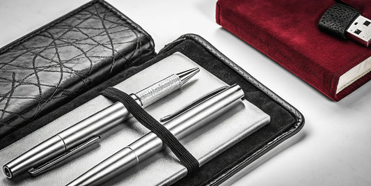 A quality pen set and notebook, useful winter promotional gifts that clients will keep.