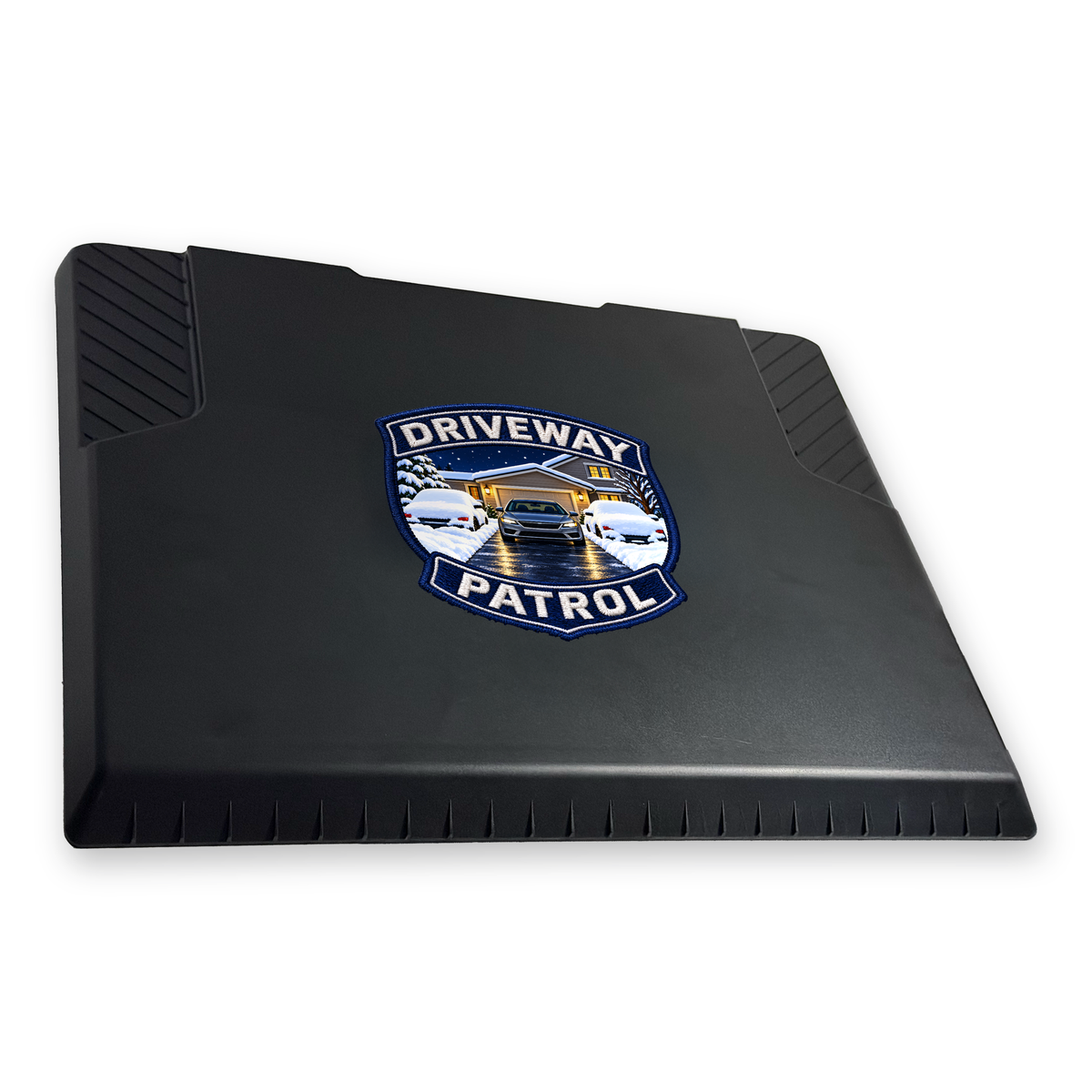 The EDGE snow and ice scraper with the Driveway Patrol Badge print, 8 x 8 in, angled view