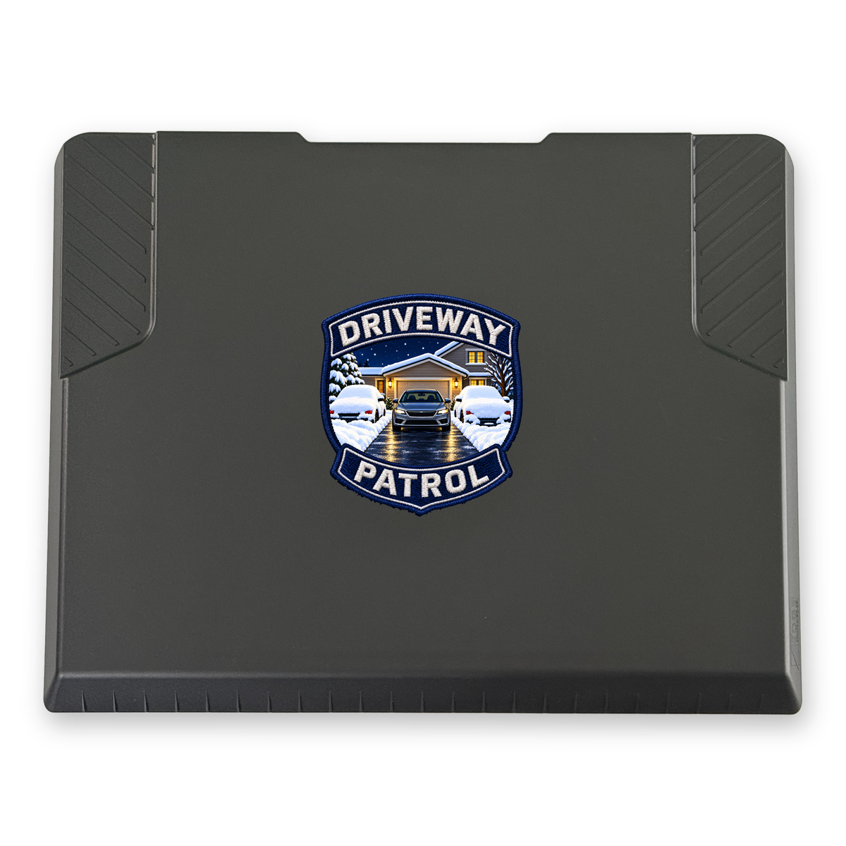 The EDGE snow and ice scraper with the Driveway Patrol Badge print, 6 x 6 in, top view