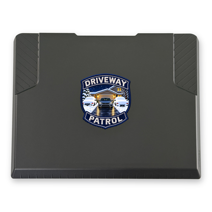 The EDGE snow and ice scraper with the Driveway Patrol Badge print, 6 x 6 in, top view