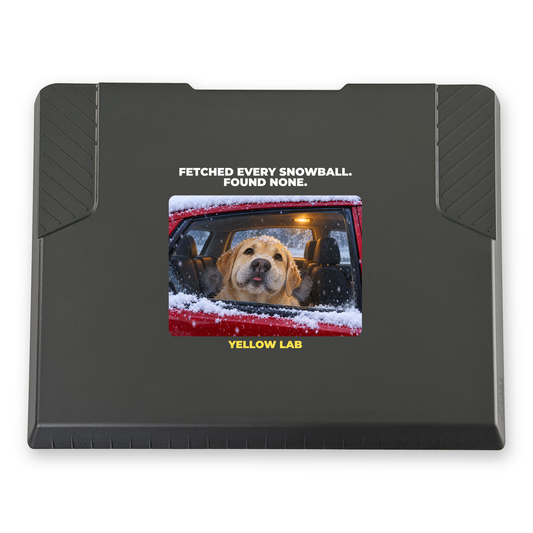 The EDGE snow and ice scraper with the Yellow Lab design "Fetched Every Snowball. Found None", 8 x 8 in, top view