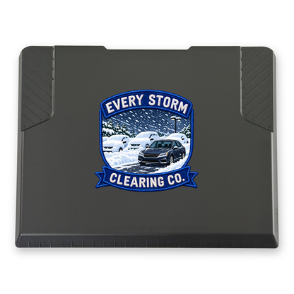 The EDGE snow and ice scraper with the Every Storm Clearing Co. print, 8 x 8 in, top view