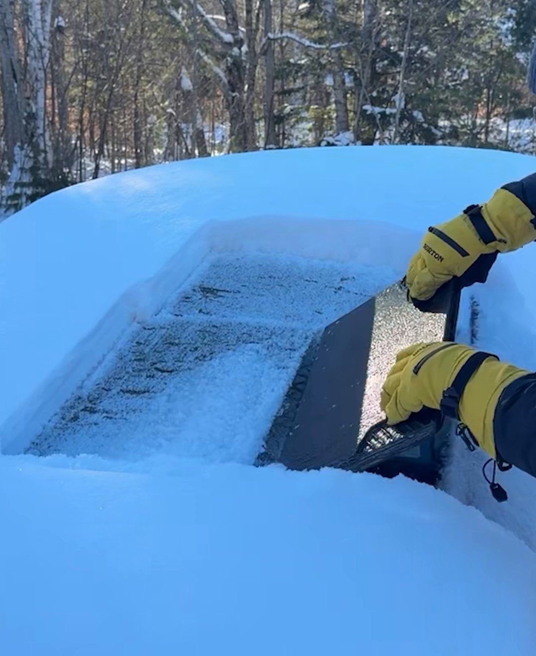 The EDGE scraping a wide band through ice on a windshield