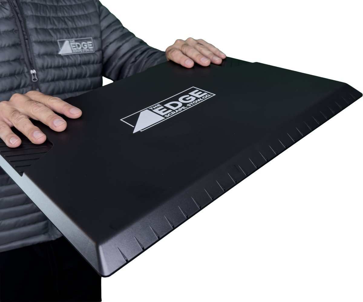 Windshield Ice Clearing Grip: both hands on the grip side, about shoulder-width apart, bull nose edge with its teeth leading